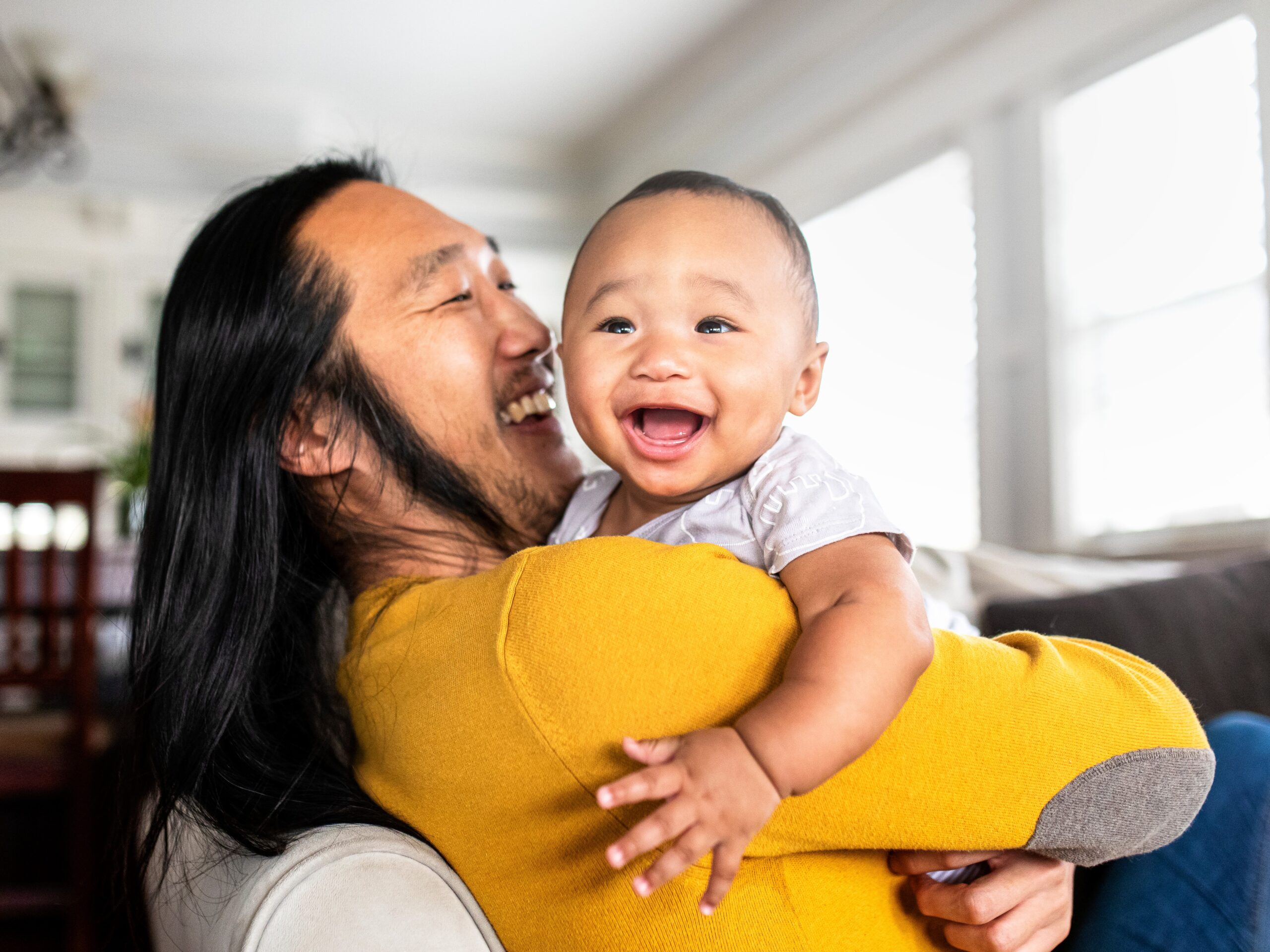 Father laughing with baby