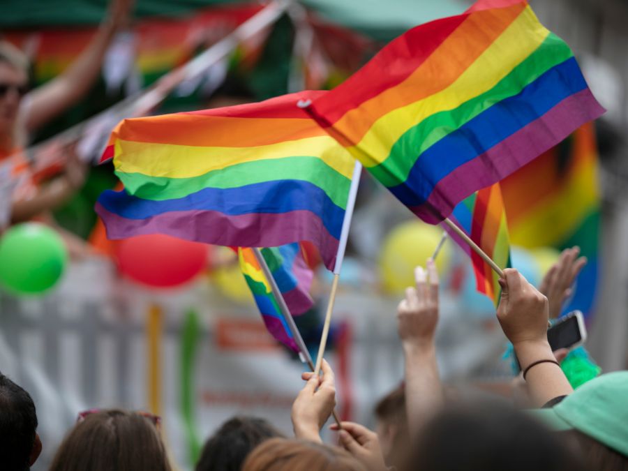 Flags at a pride parade.