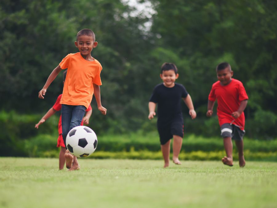 Children playing soccer.