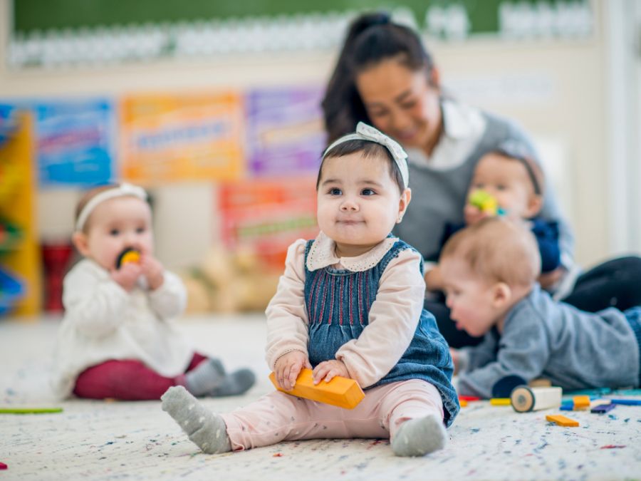 Children at daycare playing with blocks.