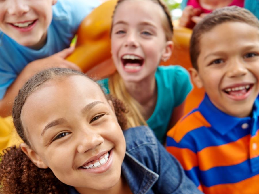 Group children smiling.